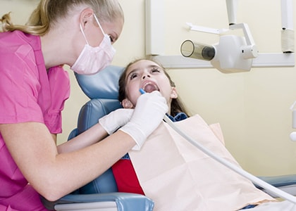 Dentist treats children