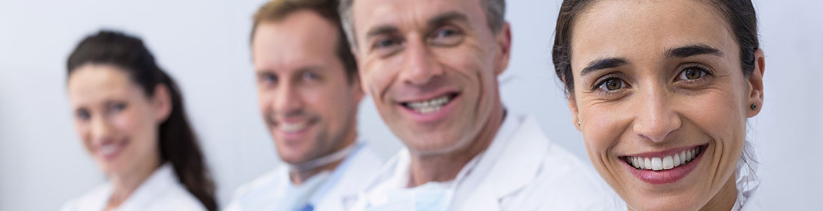 Dentists standing with arms crossed